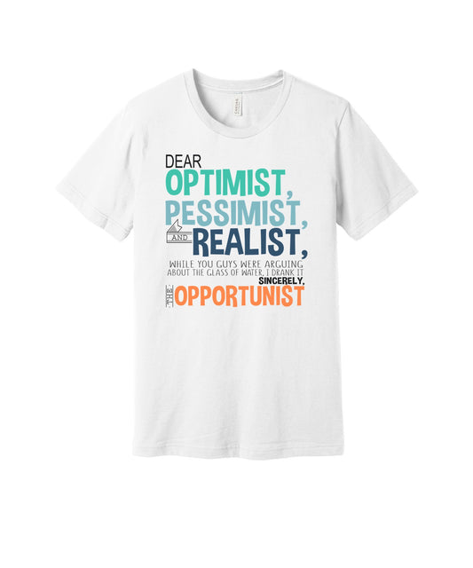 Dear Optimist Pessimist Realist graphic on a white Bella+Canvas 3001 tee