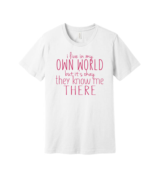 I Live in My Own World graphic on a white Bella+Canvas 3001 tee