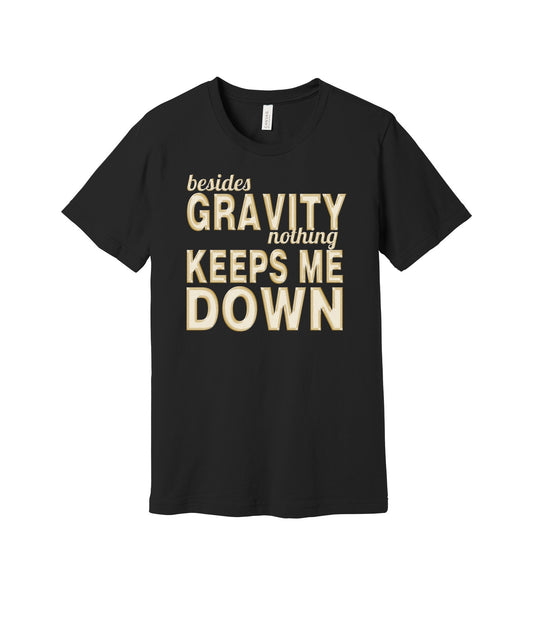 Gravity Keeps Me Down graphic on a black Bella+Canvas 3001 tee