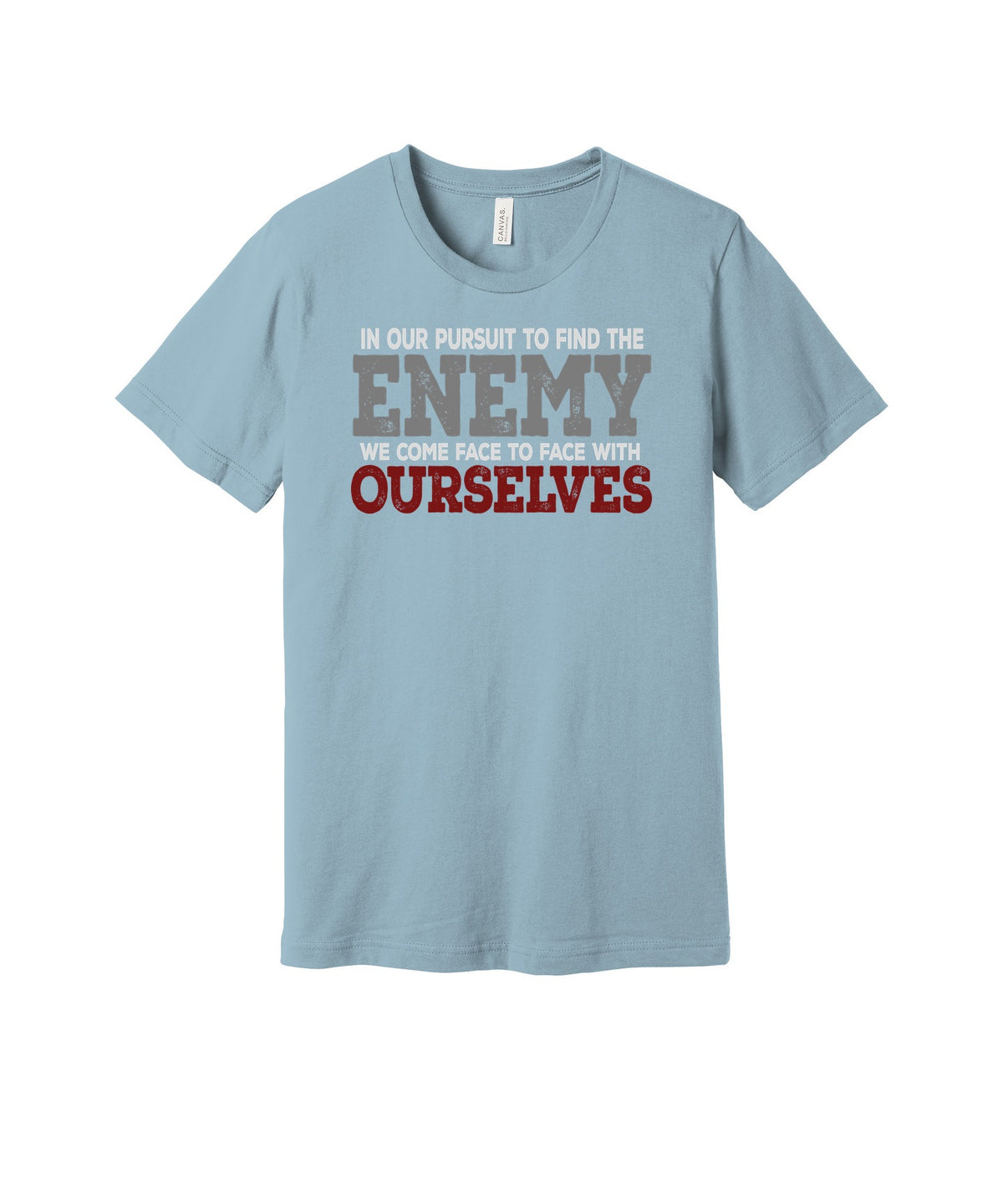 Our Own Enemy graphic on a light blue Bella+Canvas 3001 tee
