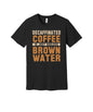 Decaf Is Useless Brown Water graphic on a black Bella+Canvas 3001 tee