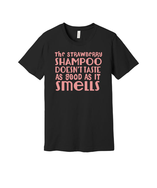Strawberry Shampoo graphic on a black Bella+Canvas 3001 tee