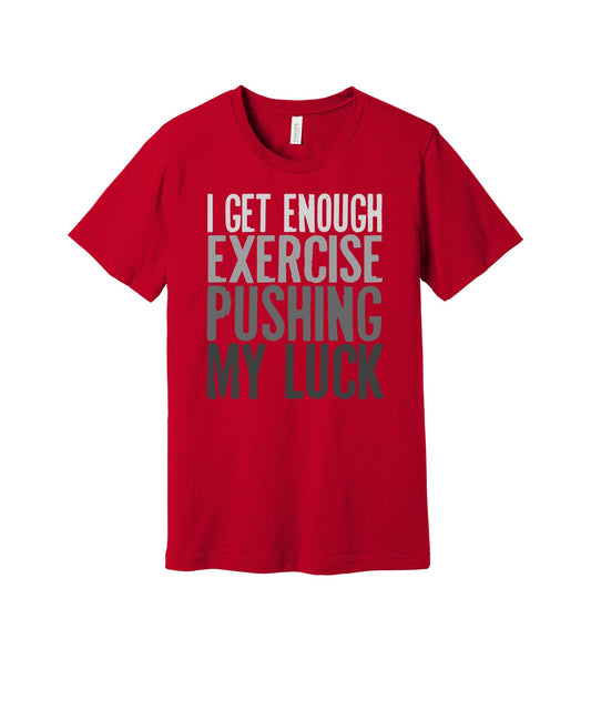 Exercise Pushing My Luck graphic on a red Bella+Canvas 3001 tee