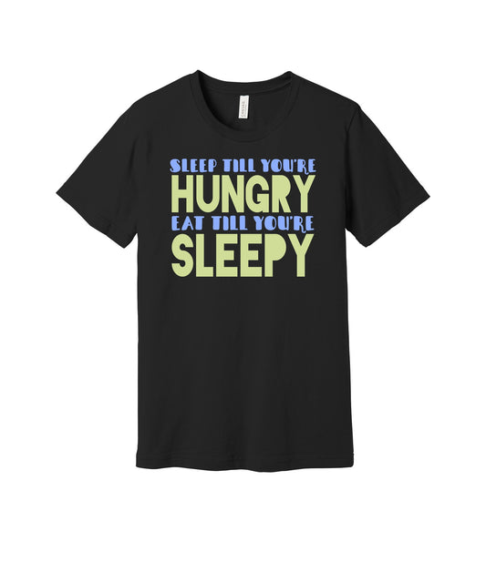 Sleep Until Hungry Eat Until Sleepy graphic on a black Bella+Canvas 3001 tee
