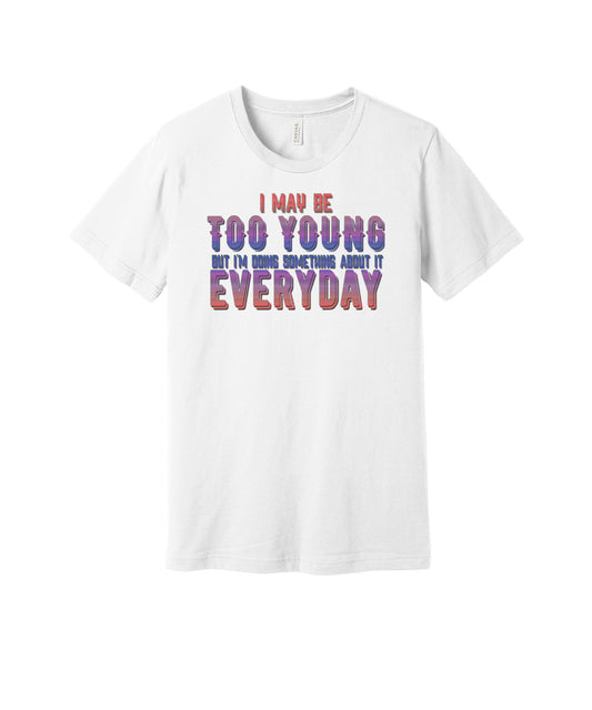 Too Young Working on It graphic on a white Bella+Canvas 3001 tee
