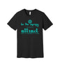 Be the Energy You Want to Attract graphic on a black Bella+Canvas 3001 tee