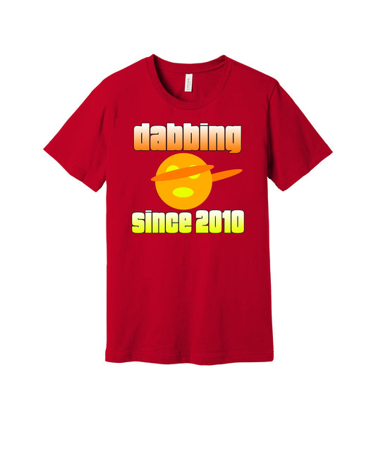 Dabbing Since 2010 graphic on a red Bella+Canvas 3001 tee