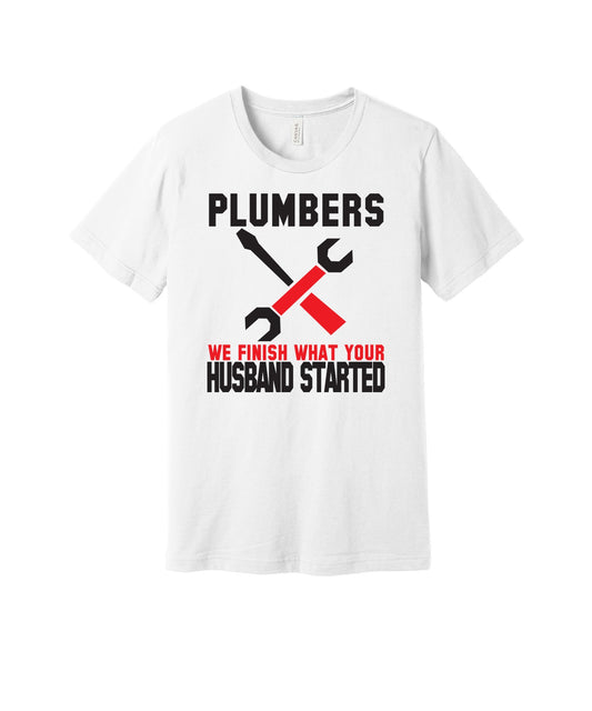 Plumbers Finish What Your Husband Started graphic on a white Bella+Canvas 3001 tee