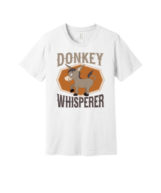 Donkey Whisperer graphic on a white Bella+Canvas 3001 tee