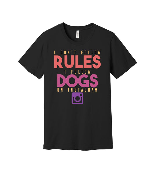 I Follow Dogs graphic on a black Bella+Canvas 3001 tee