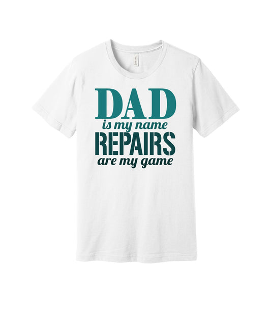 Dad Repairs Are My Game graphic on a white Bella+Canvas 3001 tee