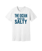 The Ocean Made Me Salty graphic on a white Bella+Canvas 3001 tee