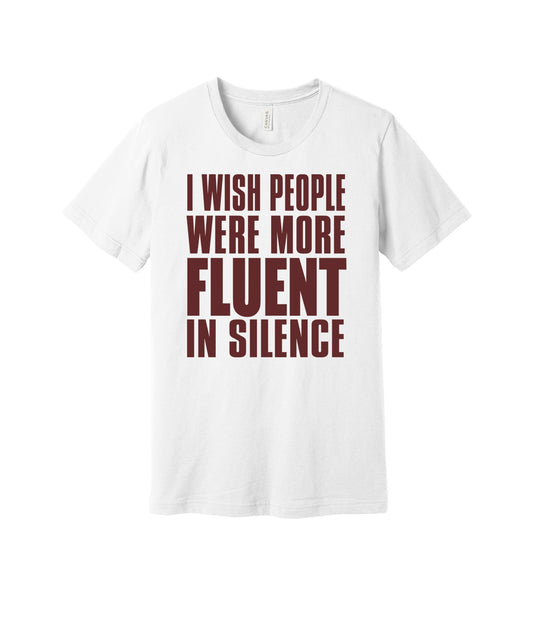 Fluent in Silence graphic on a white Bella+Canvas 3001 tee